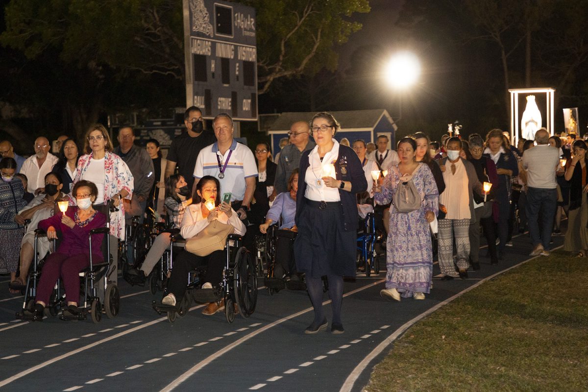 Archbishop Thomas Wenski, Auxiliary Bishop Enrique Delgado and nearly 2,000 faithful gathered at Our Lady of Lourdes Church in Miami April 11, 2022, for a Mass and procession with the relics of St. Bernadette as they embark on their first tour of the U.S. Our Lady of Lourdes in Miami and St. Bernadette in Hollywood, both in the Archdiocese of Miami, were the relics' first stop. Their tour will continue through August, stopping mostly at churches throughout the U.S. named after Our Lady of Lourdes and St. Bernadette.